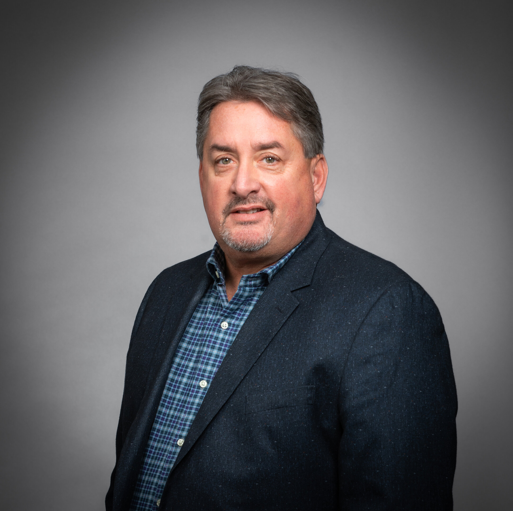 Joel Kuna Headshot Edited.jpg